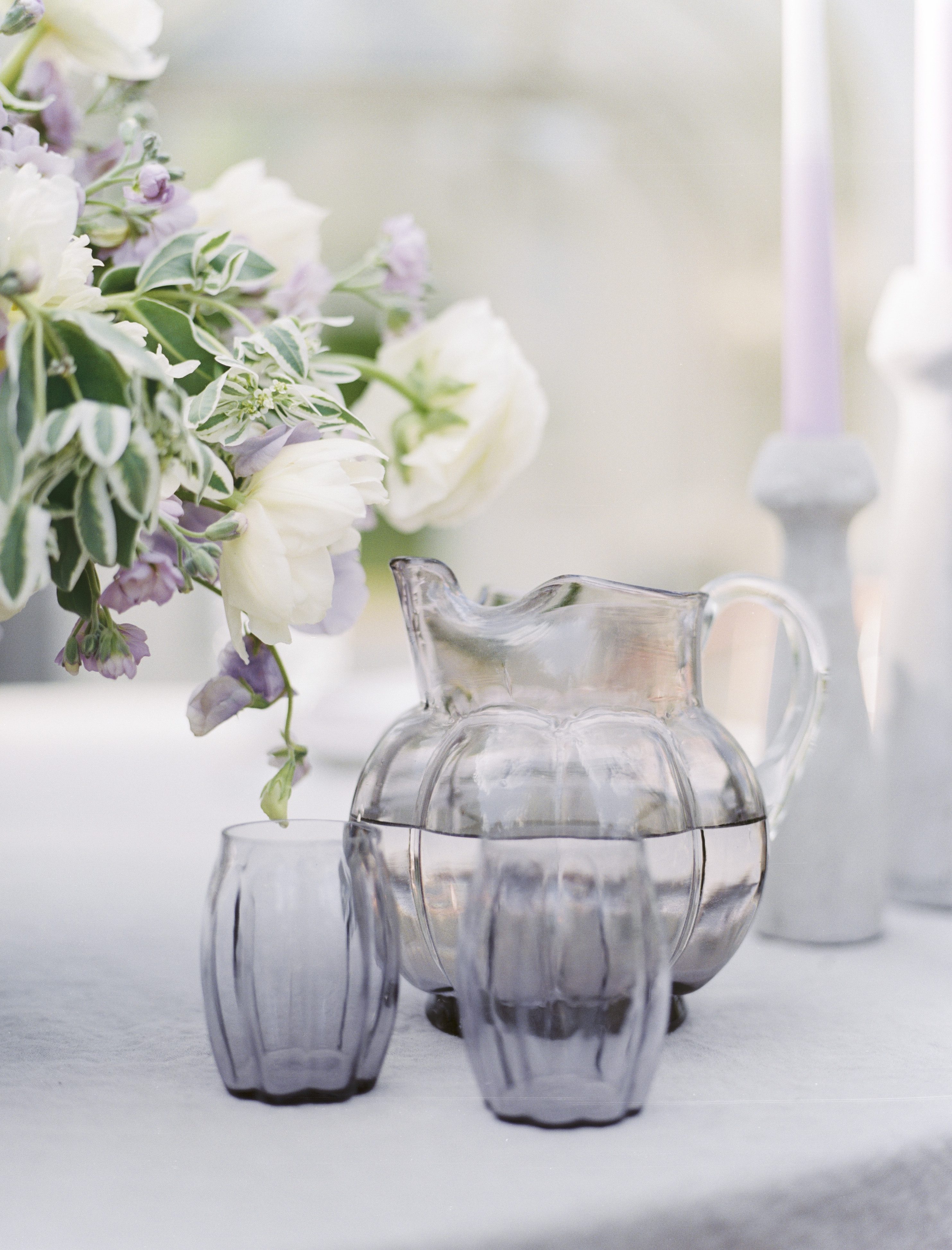lavender water pitcher at a lavender and copper wedding