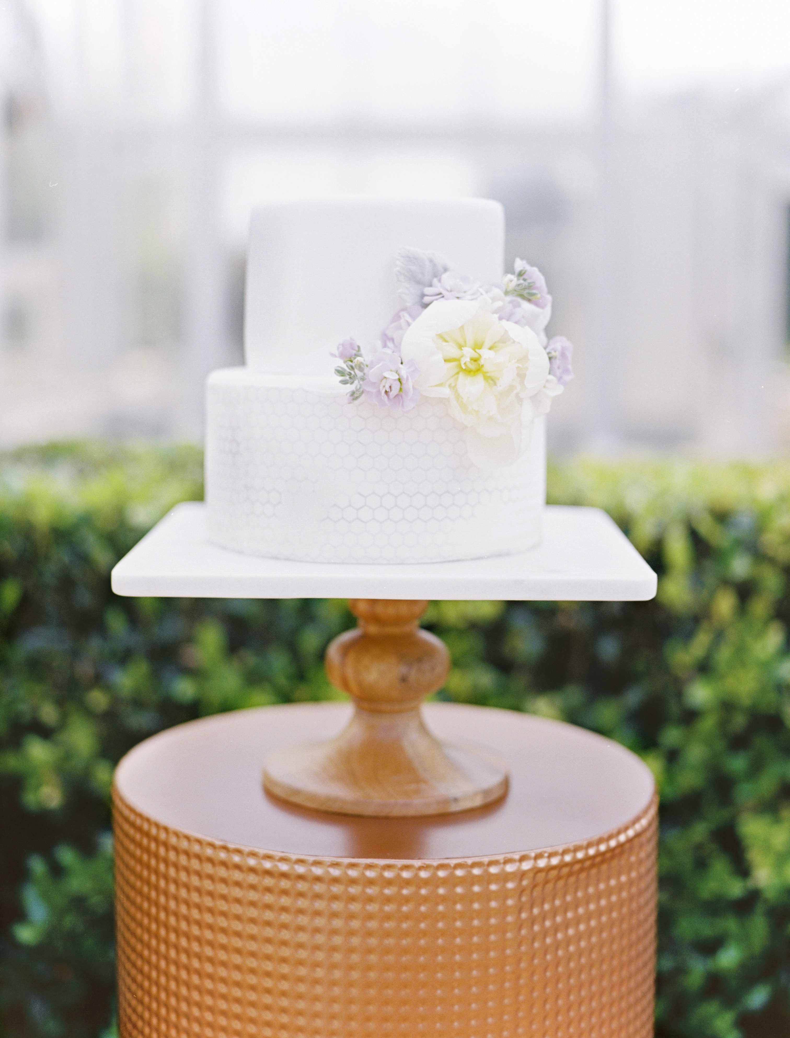 honeycomb patterned wedding cake at a lavender and copper wedding