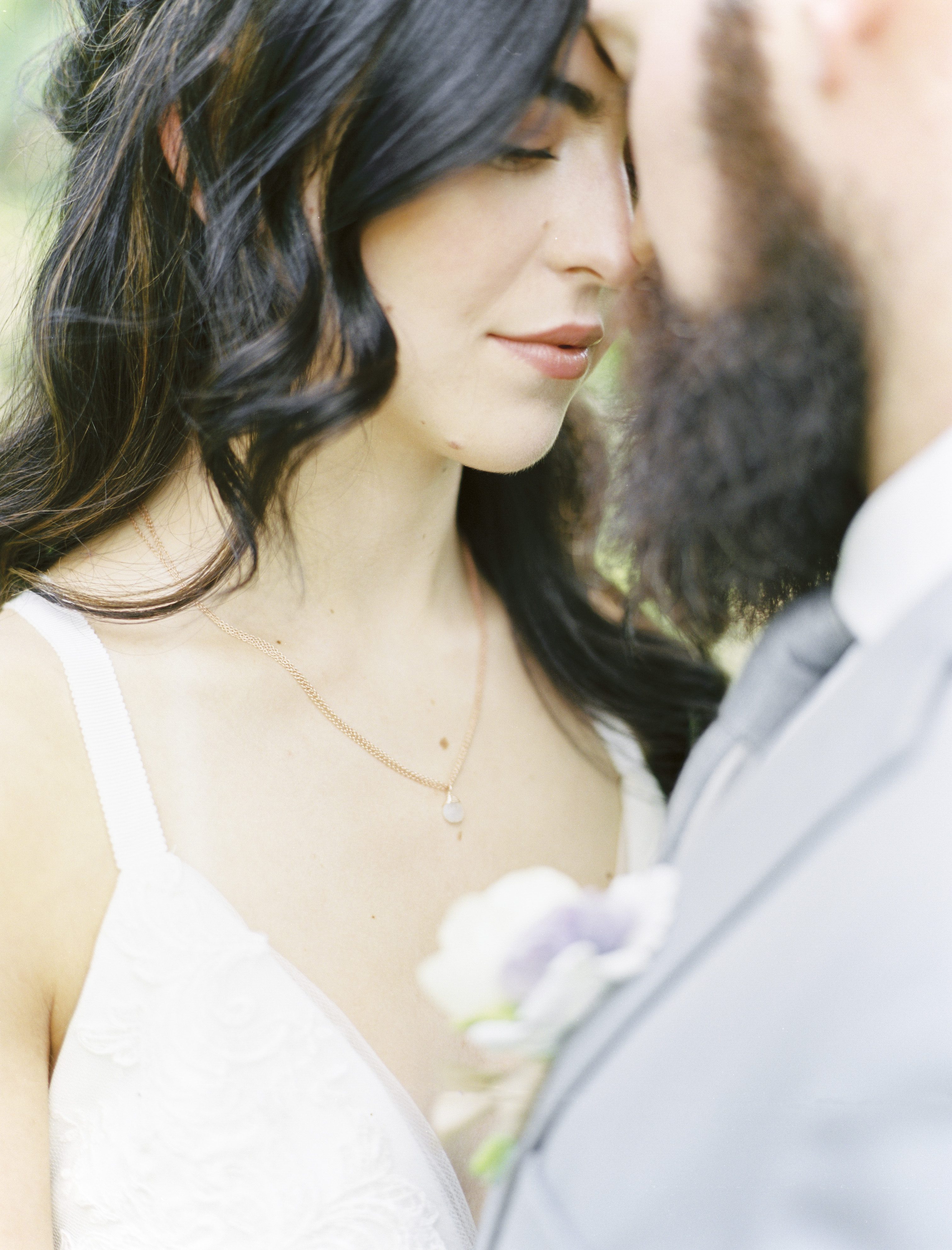 groom with a thick beard at a lavender and copper wedding