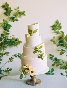 Pottery inspired wedding featuring a torn edge fondant cake