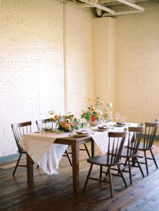 Pottery inspired wedding featuring high back windsor chairs