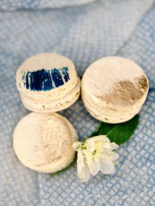 Gold macaroons with blue accents