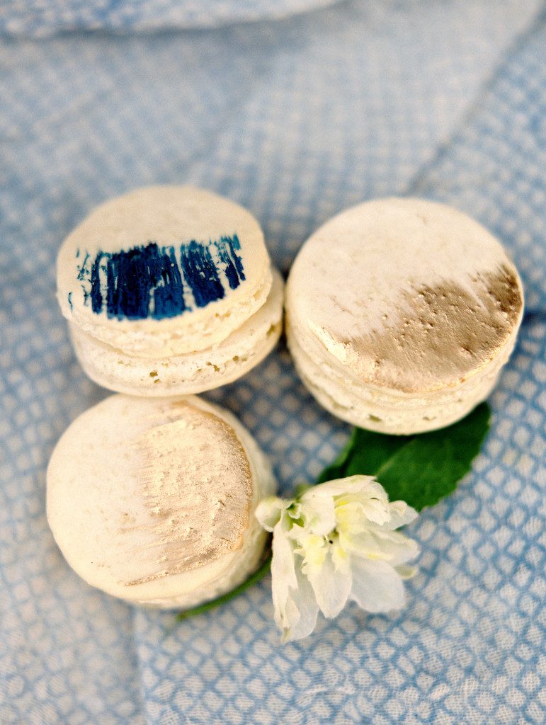 Gold macaroons with blue accents  at a Dallas elopement at the Aldredge House