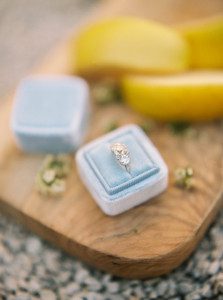 Wedding ring shot in blue and yellow color theme