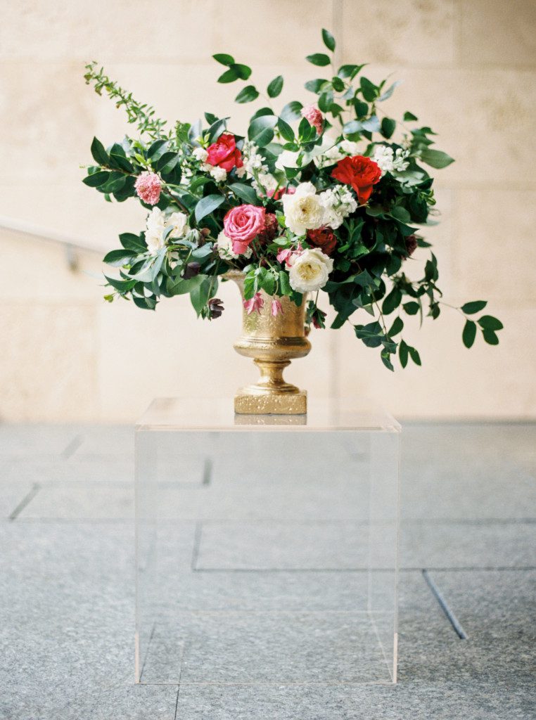 large flower arrangement on lucite box at a Nasher Sculpture Center wedding