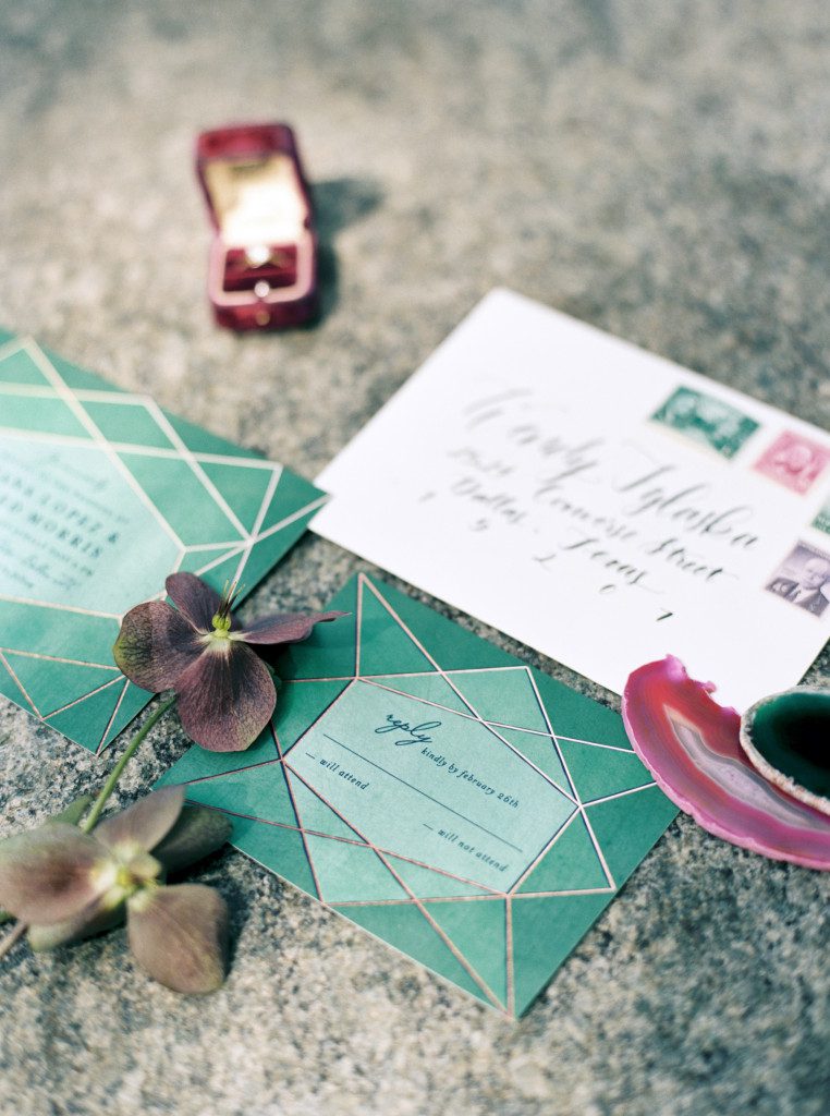 emerald wedding invitation styled with agate at a Nasher Sculpture Center wedding