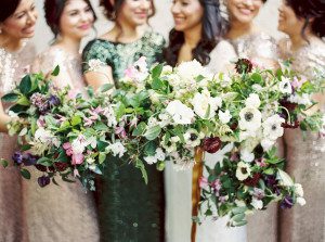 bridesmaids bouquets with anemone and purple flowers
