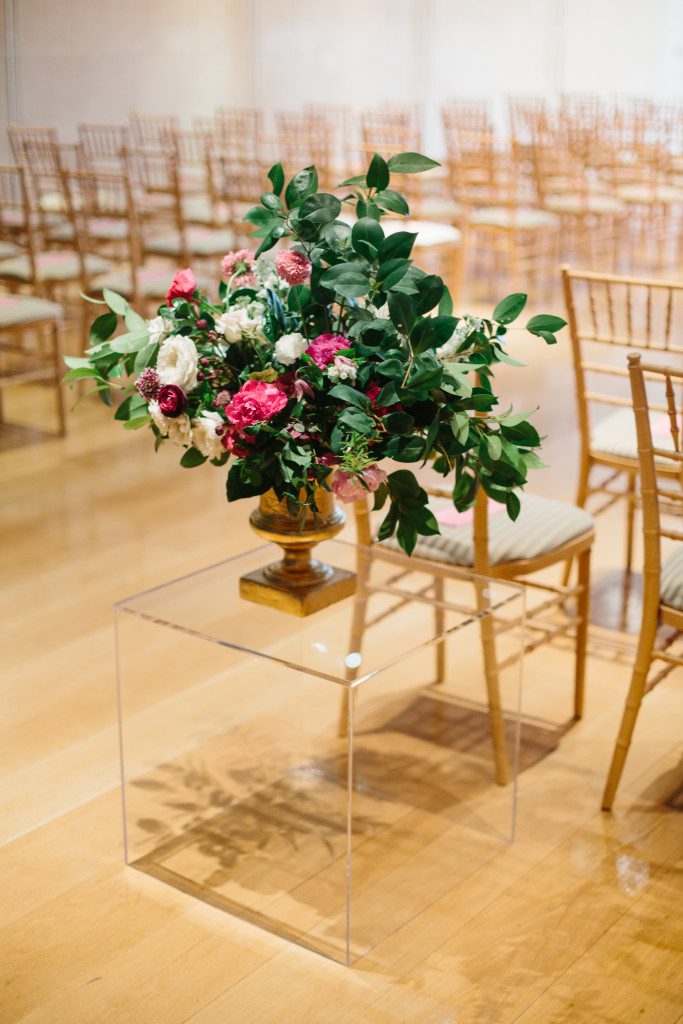 large flower arrangement on lucite box at a Nasher Sculpture Center wedding