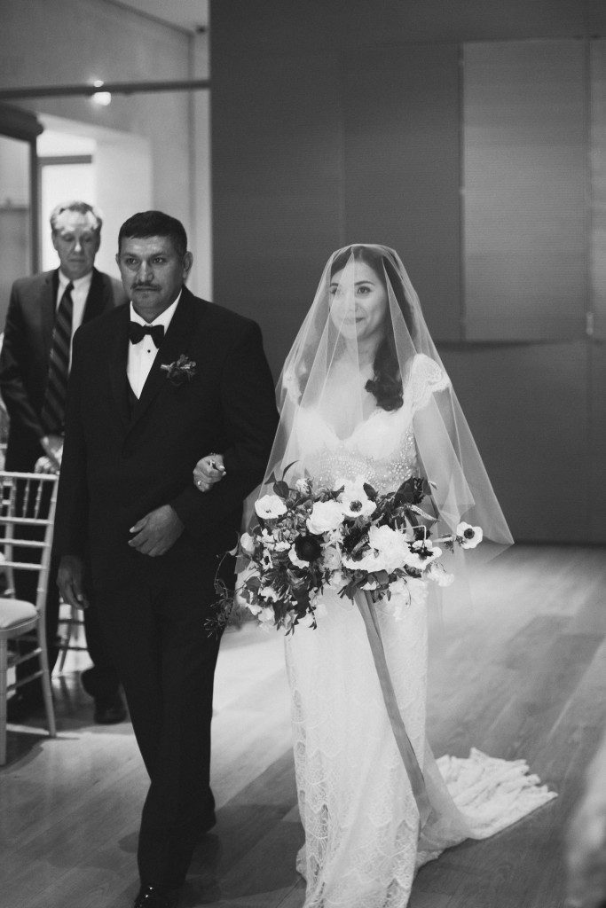 father walking his daughter down the aisle at a Nasher Sculpture Center wedding