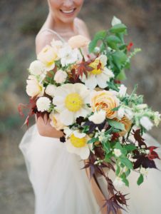 bridal bouquet with yellow peony and maple leaf