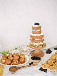 naked wedding cake with blackberries