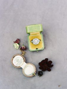 Wedding rings styled in vintage boxes