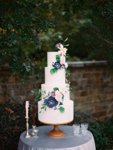 White herringbone wedding cake with sugar flowers