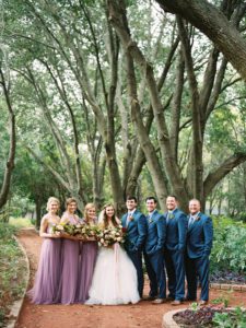 Bridal party dressed in mauve and navy
